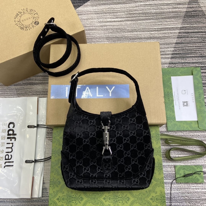 G*u*i top handle bags
